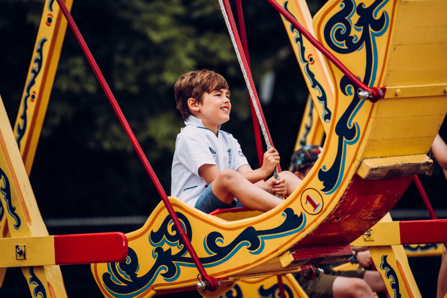 Kid in rocking swing 