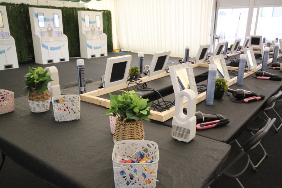 the pamper station at latitude, including mirrors, hair dryers and hair straighteners.