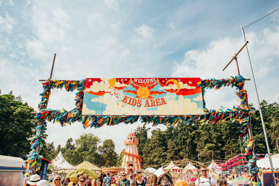 an image of the kids area entrance sign, with the helter skelter visible in the background.