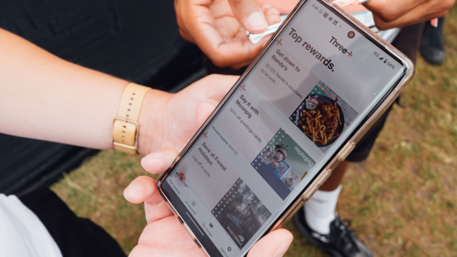 image of someone using the three+ app on their phone