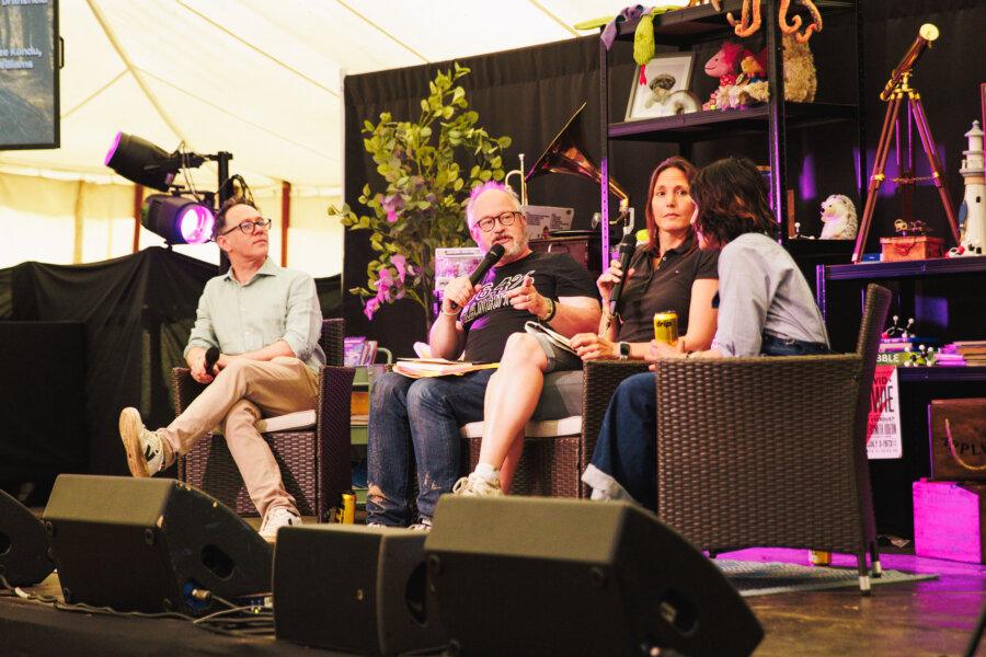 reece shearsmith, robin ince and helen czerski speaking on the apollo stage in 2025